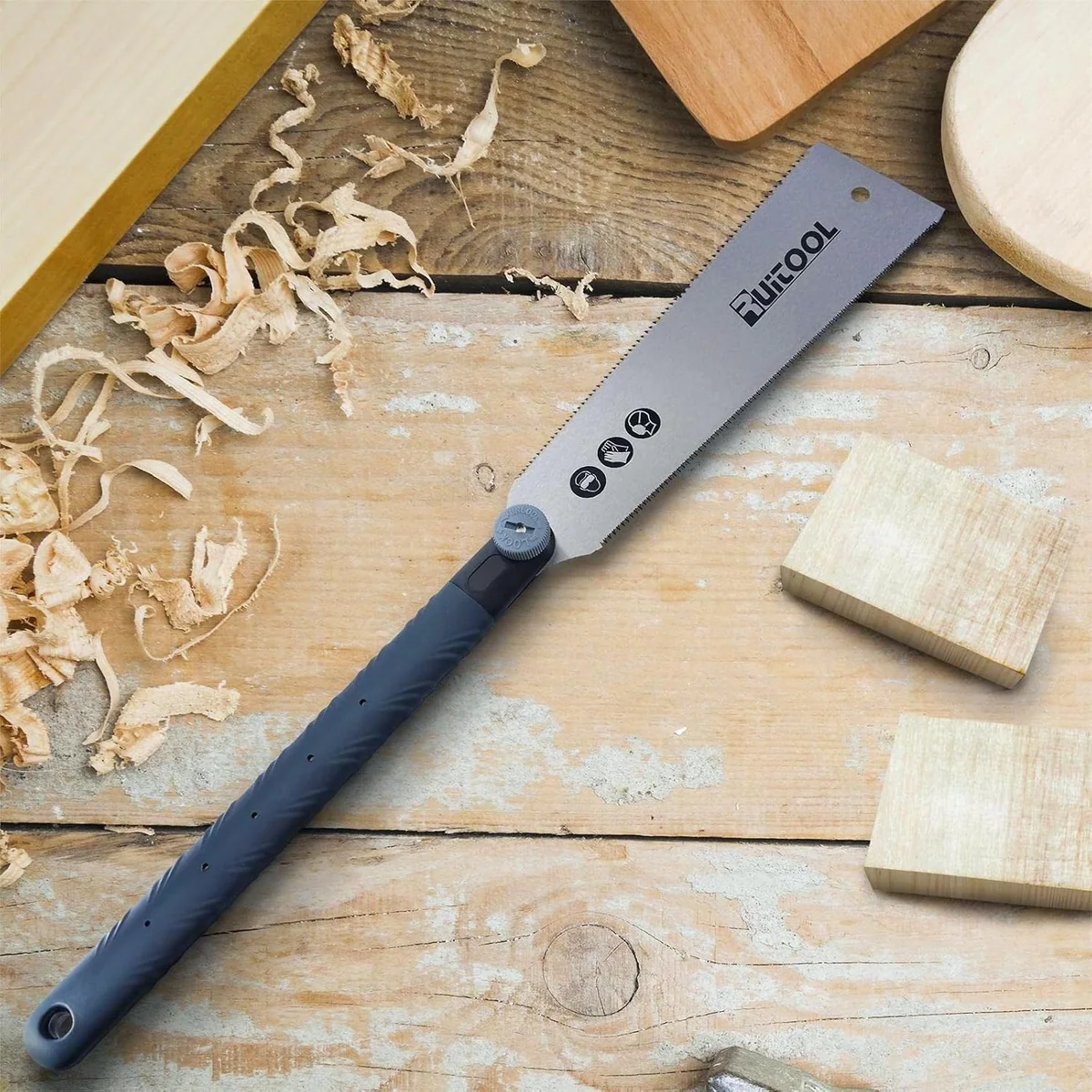 The RUITOOL 10 inch ryoba pull saw on a workbench